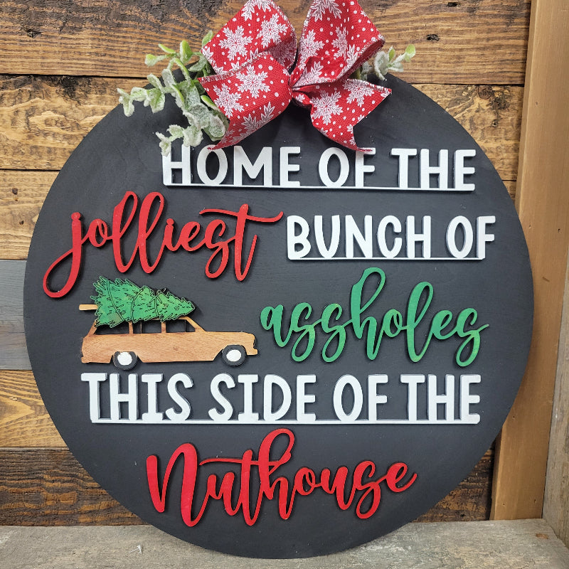 Decorative sign with humorous text on a wooden background