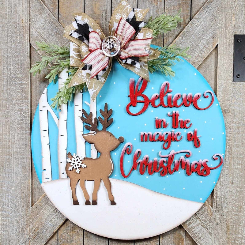 door hanger with deer believe in christmas