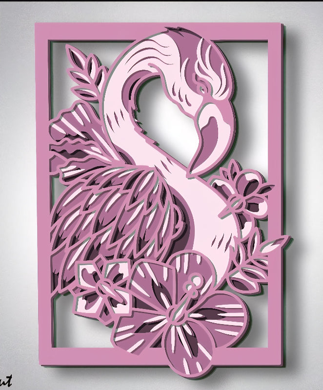 Decorative wall art with a pink flamingo design on a gray background